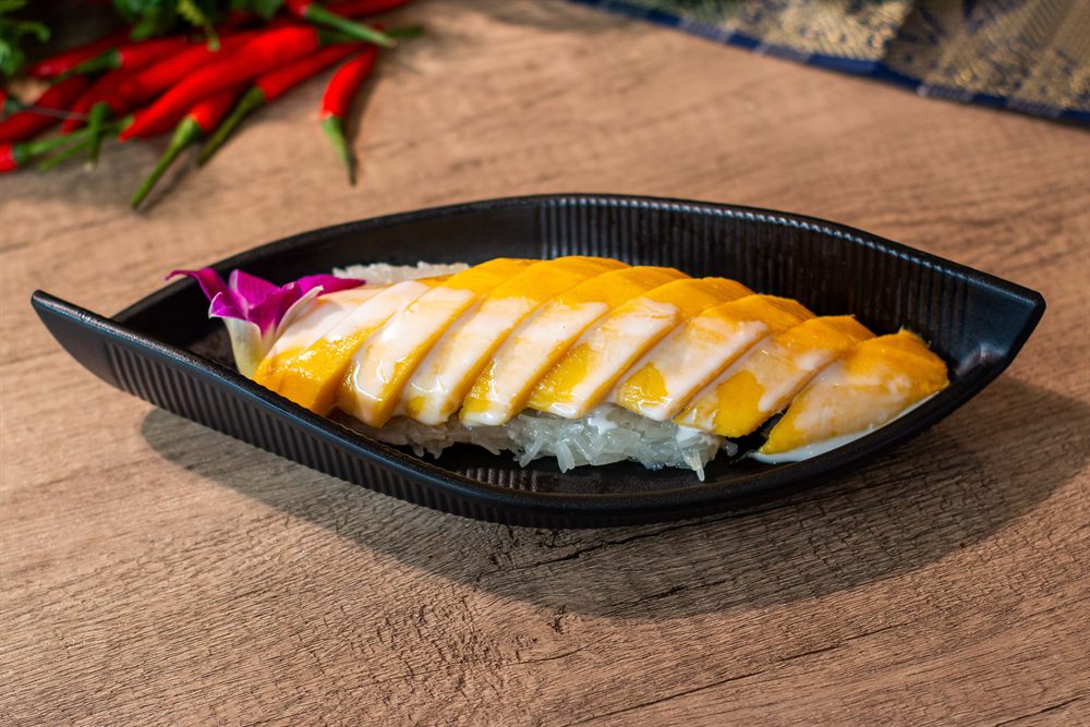 Mango sticky rice, a sweet Thai dessert.